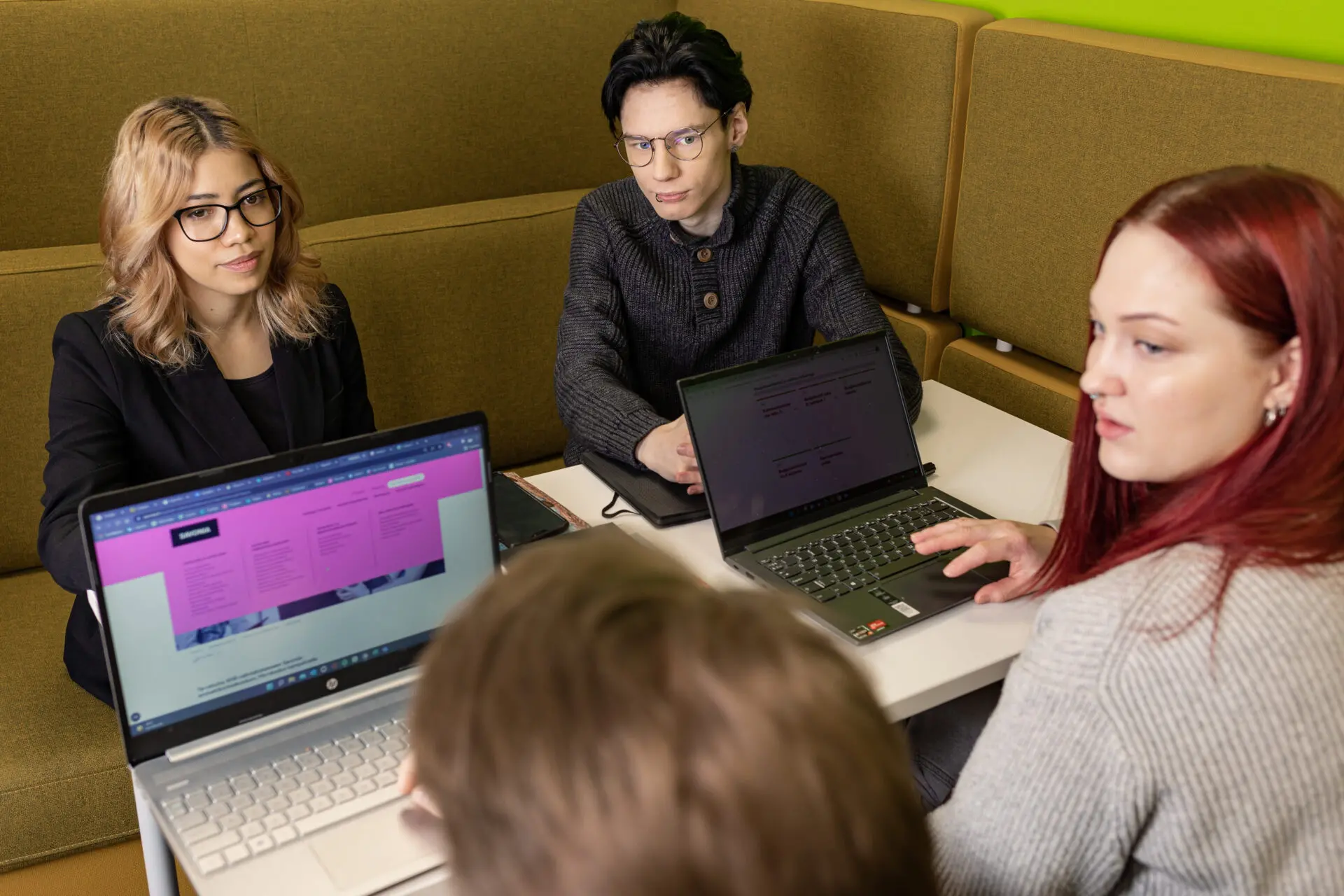 Students with laptop computers.