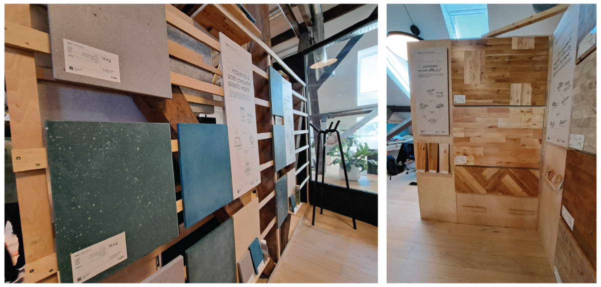 Erilaisten materiaalinäytteiden, kuten laattojen ja puupaneelien, esillepano seinille kiinnitettynä modernissa, hyvin valaistussa sisätilassa, jossa on näkyvillä tunnisteet ja kuvaukset. Taustalla on viherkasveja ja istuimia.