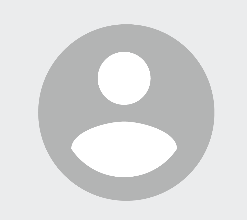 Harmaa käyttäjäkuvake, jossa on pyöreä pään ja hartioiden siluetti vaaleanharmaalla pohjalla, käytetään yleensä oletusprofiilin tai avatarin kuvana.