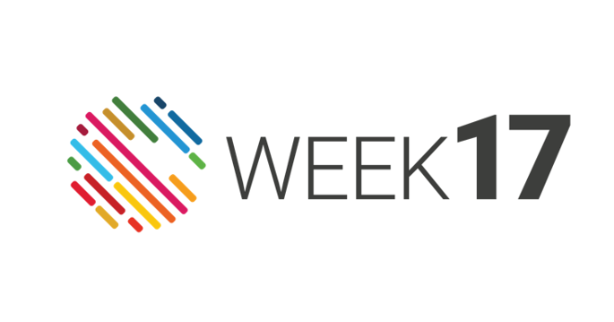 Logo, jossa on värikkäitä diagonaaliviivoja, jotka muodostavat ympyränmuotoisen muodon tekstin WEEK 17 vieressä, joka on lihavoitu, tummalla fontilla valkoisella pohjalla.