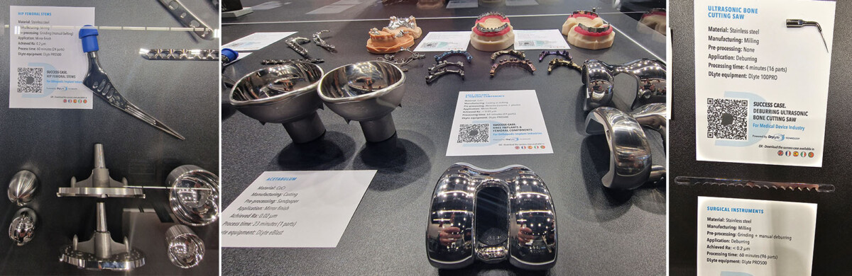 Kirurgisten implanttien, hammaslääketieteellisten mallien ja instrumenttien esittely, joka on järjestetty pöydälle, jossa on informaatiokortteja ja QR-koodeja ja jossa näkyy metallisia nivelproteeseja, hammasproteeseja ja tarkkuuskirurgisia työkaluja.